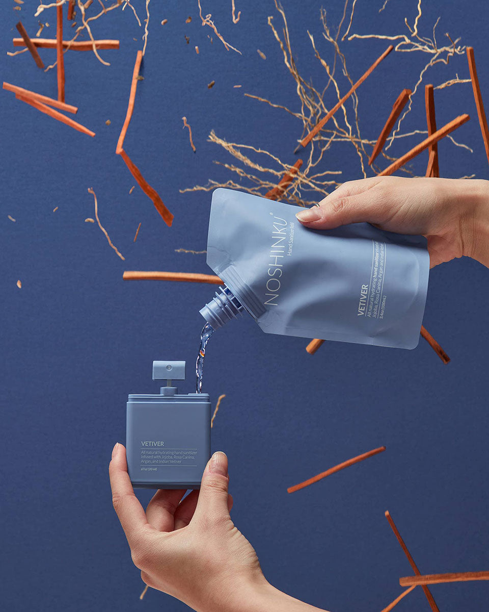 Desinfectante de manos hidratante rellenable con vetiver y pachulí