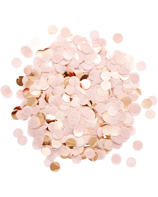 A pile of blush and rose gold 1 inch circle cut paper and mylar confetti. on a white background.