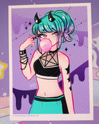 A hot cutie with blue and purple ombre hair, black horns with white hearts wearing black beaded bracelets and a black halter top with five point occult star straps at her chest. She is pointing at her temple with two fingers and blowing a bubble with her bubble gum. Her eyes are blue and pink.  She is also wearing blue and black bottoms.  It has a purple drip background.  All on high quality photo paper.