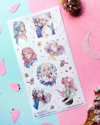 long haired girls with blue, white, or pink hair on a sticker sheet sitting on top of pink and blue paper