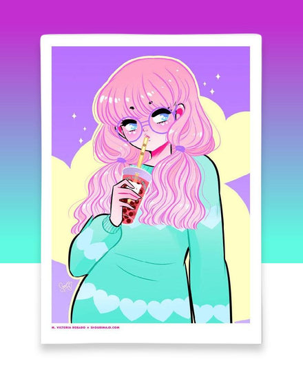 A pastel pink, mint green, purple, and yellow digital art print featuring a kawaii manga girl with pink hair and big light blue eyes.  She is wearing purple glasses and a mint heart sweater pullover.  In her hand, she is holding a boba tea with a kitty cat printed on the outside of the cup.  This is printed on high quality photo paper.