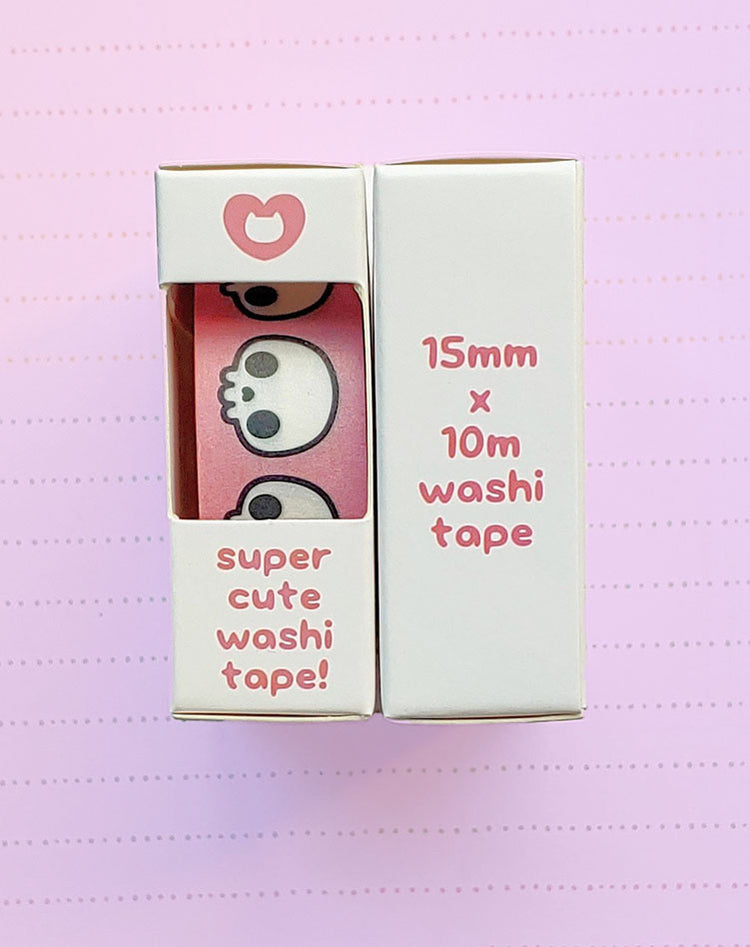 Adorable kawaii black and white skulls on a coral pink washi paper tape