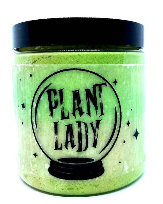 Plant Lady green and yellow colored sugar body scrub featuring the scents squeezed oranges, pineapples, bananas, coconut, and fresh kiwi. Fragrance free.  Whipped soap base.  Handmade.  Created by Roman & Grey Bath co.
