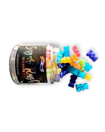 Dark blue, light blue, red, orange, yellow, green, and purple gummy bear style mini soaps for on-the-go or use at home.