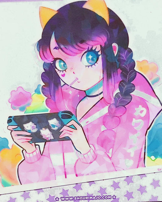 A close up of: A cute kawaii manga teen gamer girl wearing a pink and white hoodie with a sucker in her mouth and yellow cat ears on her head is seen in front of cotton candy clouds of pink, yellow, blue, and green while playing on her nintendo switch with blue joy cons.  The switch has cute kitty stickers on the back.  This image is printed on broken glass holographic vinyl and is 3 inches long.