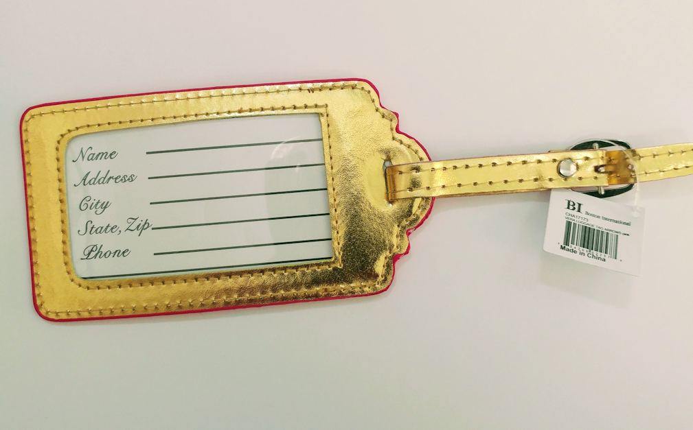 gold toned foil backside with id window.  Contact card included